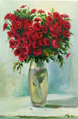 Chrysanthemums in a glass vase