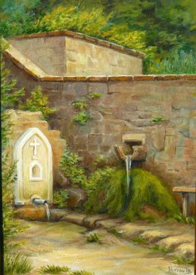 The spring of "Youth" (silver water) in the ancient Armenian monastery. Golub Tatyana