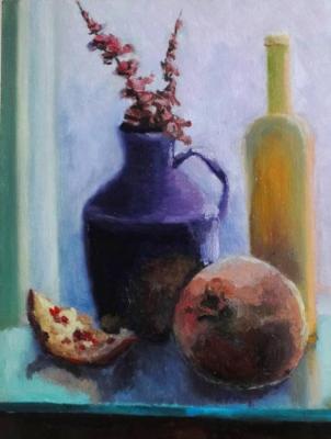 Still life with pomegranate and blue vase