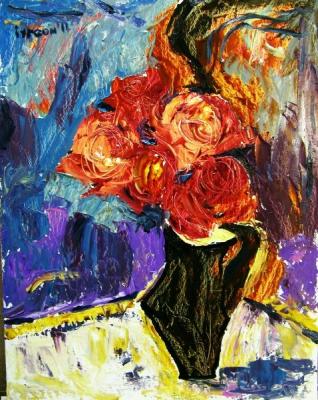 Red flowers in black vase