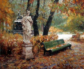 Summer garden. First snow