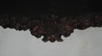 Fragment of the lower part of the carved frame