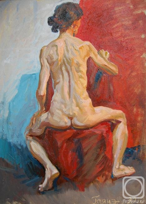 Dobrovolskaya Gayane. A model sitting on a chair with her back to the viewer
