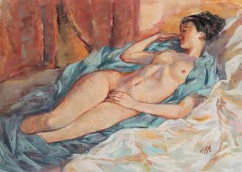 Lying on the blue bedspread. Vyrvich Valentin