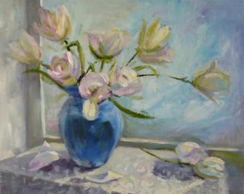 White tulips in a blue vase. Drobot Aleksandra