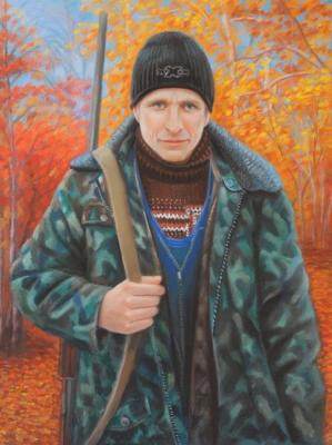 Portrait of a hunter against the background of the autumn forest. Sidorenko Shanna