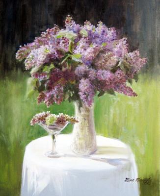 Lilac on a white table. Krasnova Nina