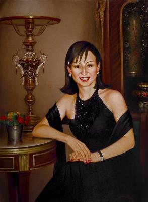 Portrait of young woman in evening dress. Mazur Nikolay