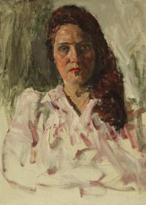 Portrait of a young woman with red hair. Gremitskikh Vladimir