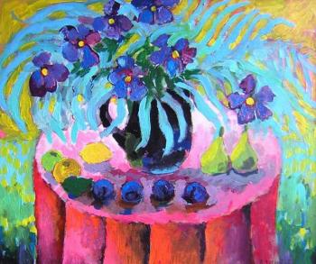 Irises on a red table