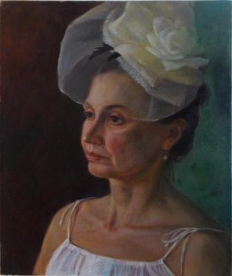 Portrait of a woman in a white hat. Shumakova Elena