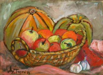 Two pumpkins and a fruit basket