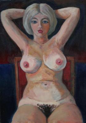 Sitting on a red chair with hands behind head (Femina). Klenov Valeriy