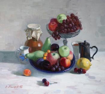 Grapes, a blue bowl and a coffee pot